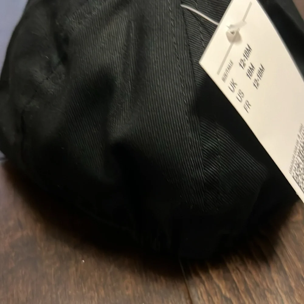 NWT Gender Neutral H and M Rolling Stones Flat Rim Hat!